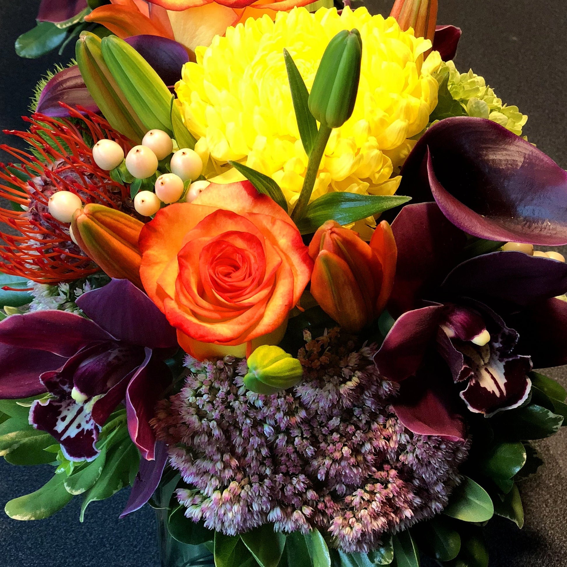 Orange, Purple, and Yellow Exotic Centrepiece Fleuressence 