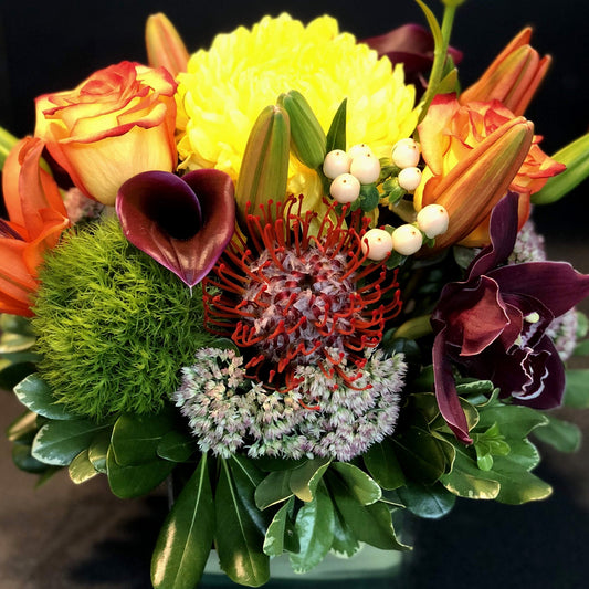 Orange, Purple, and Yellow Exotic Centrepiece Fleuressence 